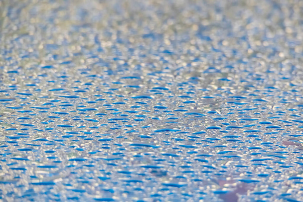 close up rain droplets on the surface - Zdjęcie, obraz