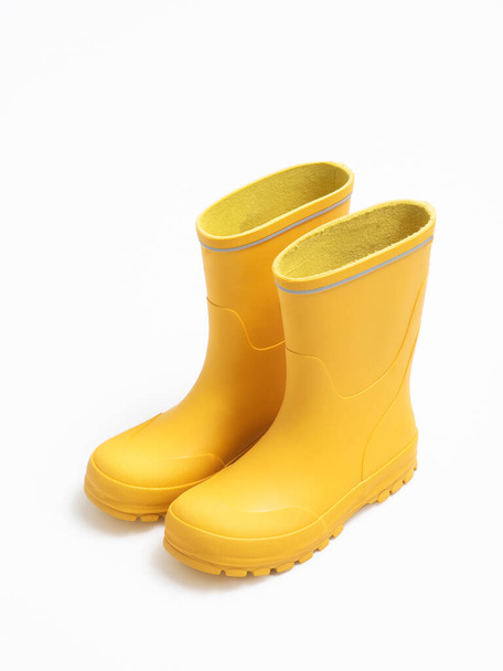 Yellow rubber boots isolated on whit - Foto, immagini