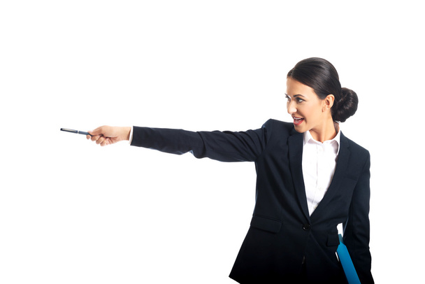 Happy businesswoman pointing to the left by pen - Photo, image