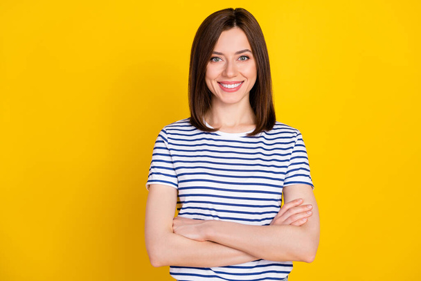 Photo of pretty nice woman wear trendy outfit clothes arm folded show bright smile isolated on yellow color background. - Valokuva, kuva
