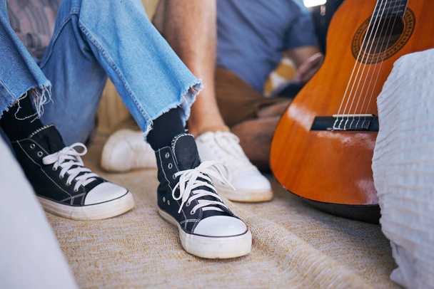 Shoes, guitar and people, music and musician break from rehearsal, concert or live performance, friends and band. Artist feet, song and creative, instrument and musical couple with acoustic - Fotó, kép