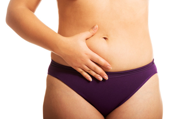 Womans fat belly in underwear - Φωτογραφία, εικόνα