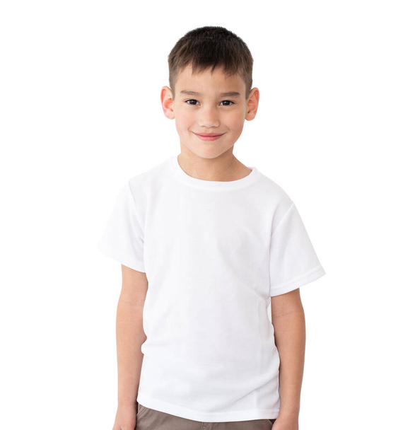 T shirt mock up. Cute little boy in blank white t-shirt isolated on a white background. - Photo, Image