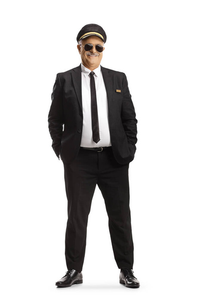 Full length portrait of a professional mature chauffeur posing isolated on white background - Φωτογραφία, εικόνα