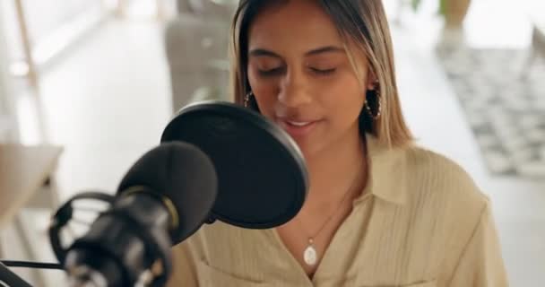 Music, sing and podcast with a woman artist singing into a microphone in a live broadcast while streaming or recording. Influencer, singer and studio with a female musician performing for radio. - Felvétel, videó