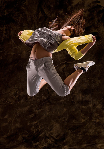 Teenage girl jumping - Φωτογραφία, εικόνα