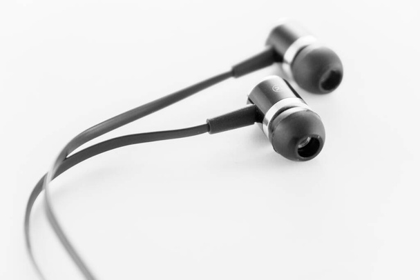 Classic black ear bud headphones - Photo, Image