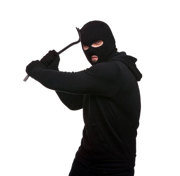Thief in mask with crowbar on white background - Fotoğraf, Görsel