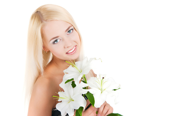  blond girl with a lily  - 写真・画像