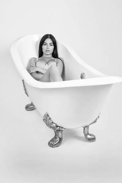 Cute and stylish. sexy woman relax in bathtub. female fashion and beauty. beautiful lady with fashionable makeup. sexual young girl in formalwear. glamour and pretty. woman skincare portrait. - Fotoğraf, Görsel