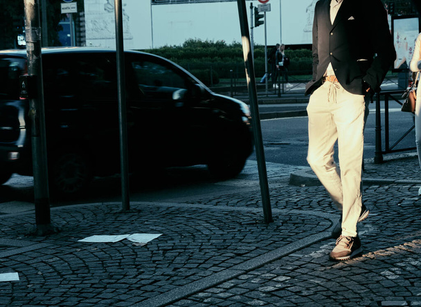 distinguished gentleman elegant man walking in the street - Fotó, kép