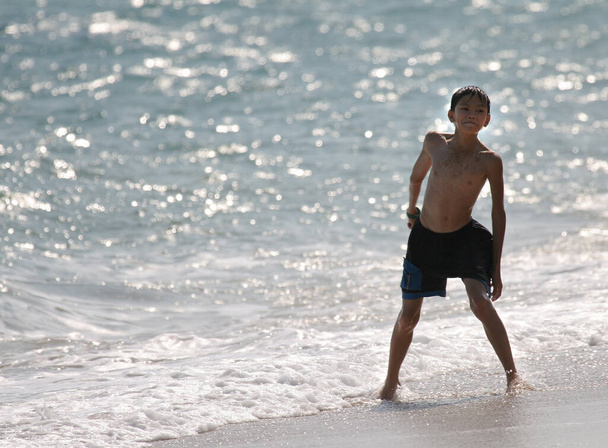 boy Playing by the seaside - Photo, Image