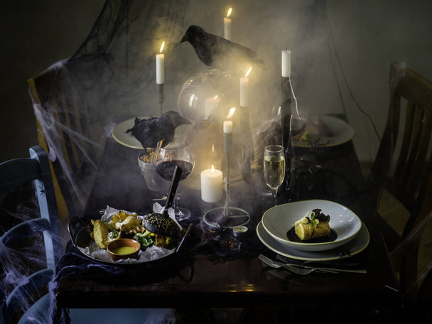 Configuración de mesa de cena Halloween
 - Foto, imagen