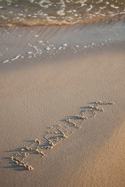 Text written on sandy beach  - Photo, Image