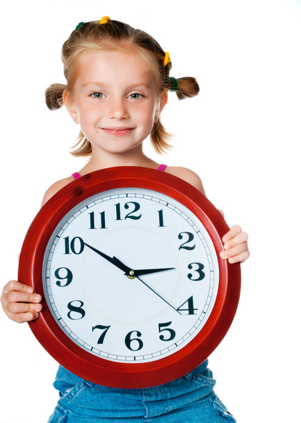 Little girl with clock - Фото, зображення