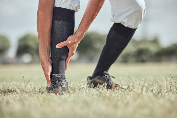 Sports man, ankle injury and athlete pain during workout training or sport competition. Athletic player leg accident, muscle ache medical emergency or suffering from inflammation on grass field. - Foto, Bild