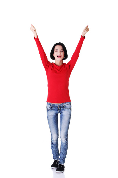 Full length woman in a winner gesture - Фото, изображение