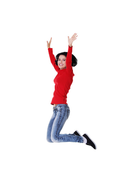 Полностью веселая женщина прыгает
 - Фото, изображение