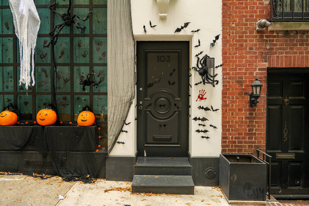 The front door of a house with Halloween decorations. High-quality photo - Photo, Image