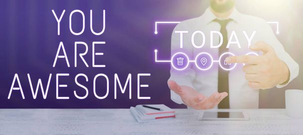 Text sign showing You Are Awesome, Business approach Motivation, appreciation, admiration, and compliment to someone Man With A Pen Pointing On Digital Symbols Showing Creative Ideas. - Photo, Image