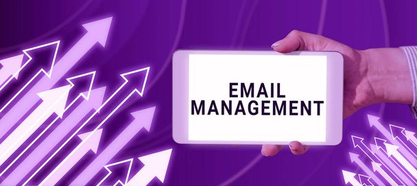 Handwriting text Email Management, Business overview giving you the power to take control of your own destiny Businessman Holding A Tablet On Hand With Arrows Going Up Abstract Design. - Photo, Image