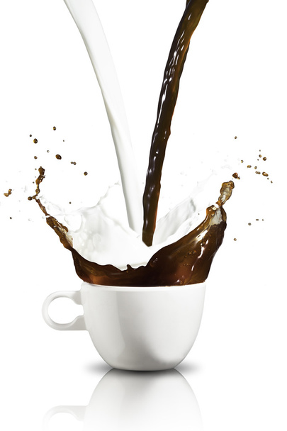 Coffee and milk splash from cup - Valokuva, kuva