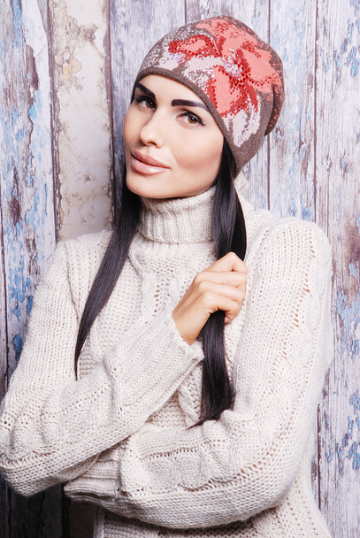 Pretty brunette woman in warm hat - Fotó, kép