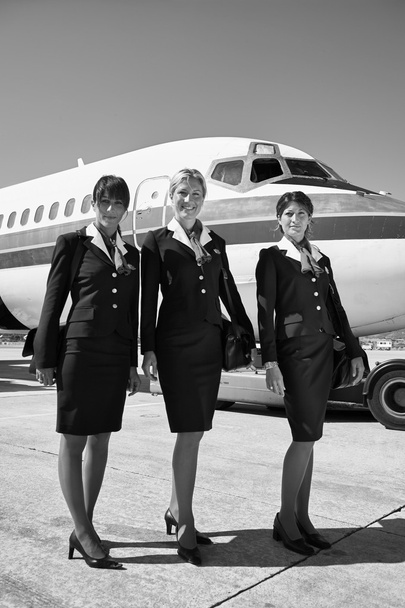 Flight assistants near an airplane - Photo, Image