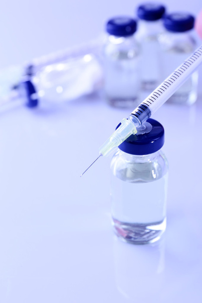 Vaccine in vial with syringe - Foto, Imagen