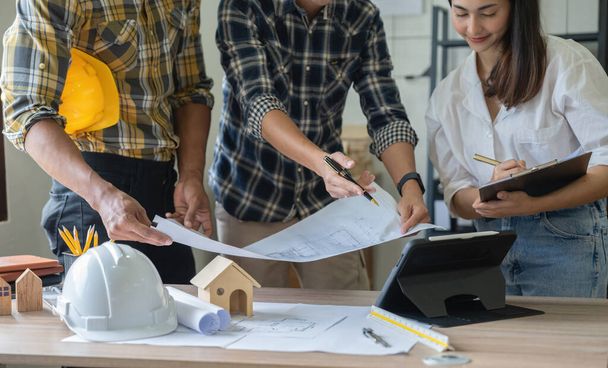Group of engineer and architect working in office with blueprints, inspection in workplace for architectural plan, construction project, Business construction - Foto, imagen