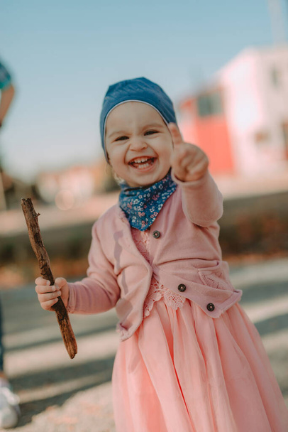 Adorable smiling girl on blurred background - Photo, Image