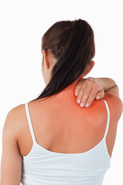 Вид на спину жінки з болем у шиї
 - Фото, зображення