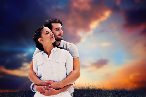 "Composite image of cute couple embracing with eyes closed" - Photo, Image