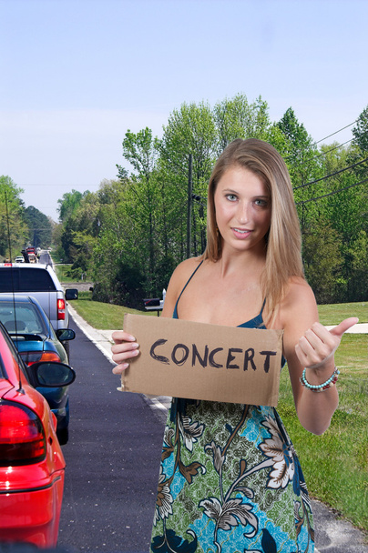 Woman Hitch Hiking to a Concert - Photo, Image
