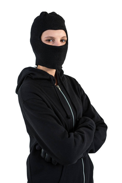 Portrait of female hacker standing with arms crossed - Foto, imagen