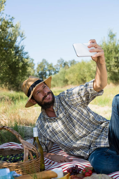 Man taking a selfie from mobile phone - Photo, Image