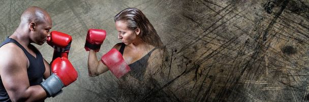 "Боксерський боксер чоловік і жінка з темним гранжевим переходом
" - Фото, зображення