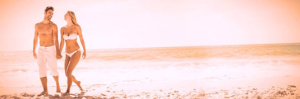 longitud completa de la pareja en la playa
 - Foto, Imagen