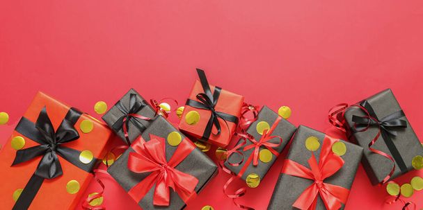 Many gift boxes on red background, top view - Foto, Imagem