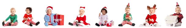Collage de bebés lindos en trajes de Navidad, con regalos y bolas sobre fondo blanco - Foto, imagen