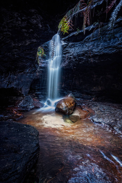 "Waterfall tumbles in a small canyon in Blue Mountains" - 写真・画像