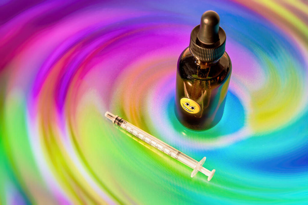 Bottle of diluted LSD used for microdosing - Photo, Image