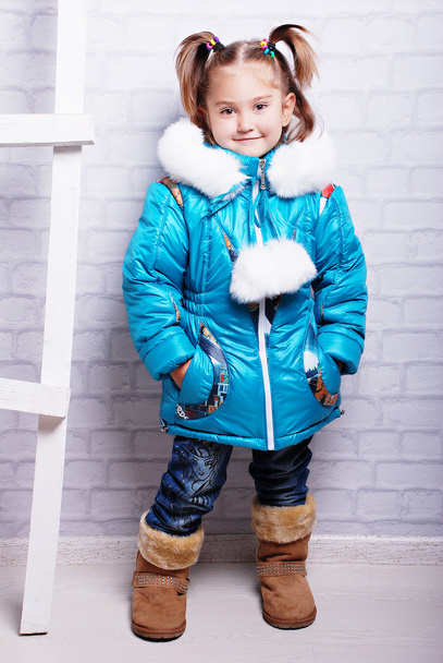 Little girl in winter coat - Foto, immagini
