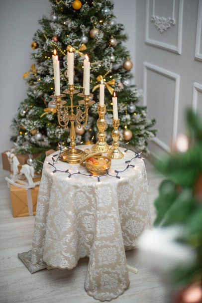 New Years festive table setting, cutlery, decorations, New Years decor, Christmas serving. - Photo, image