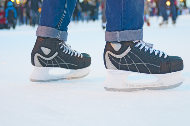 Ice skater on skating rink - Фото, изображение