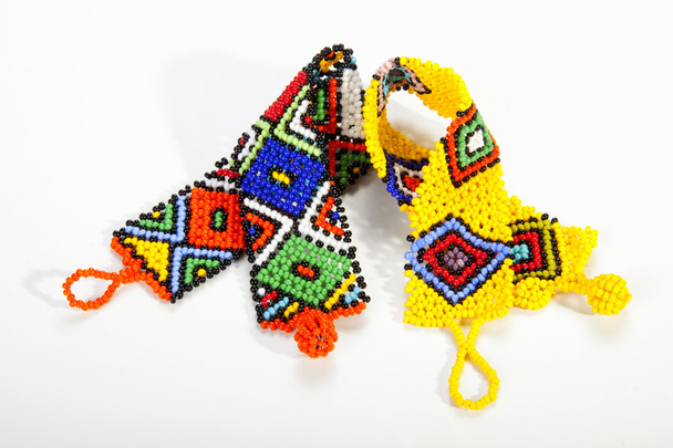 Brightly Colored Zulu Beaded Wristbands in Shape of Aids Ribbons - Photo, Image