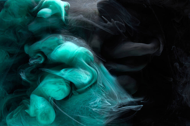 Emerald abstract background, luxury smoke, acrylic paint underwater explosion, cosmic swirling aquamarine ink - Foto, Imagen