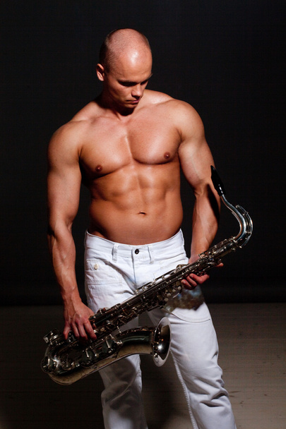 Man playing sax - 写真・画像