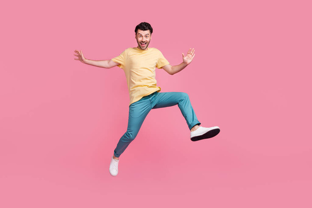 Full length photo of nice good mood boy wear comfort street outfit hurry black friday sale empty space isolated on pink color background. - Foto, Bild