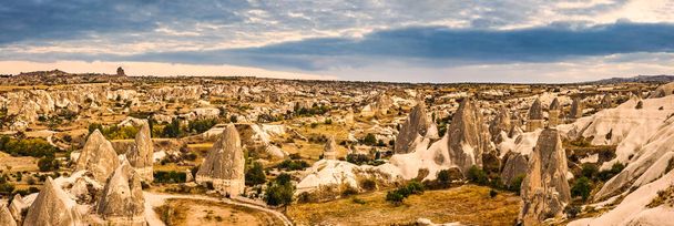 Panoramic view of Love Valley, Goreme, Turkey. Goreme is known for its fairy chimneys, eroded rock formations. - Foto, Imagem